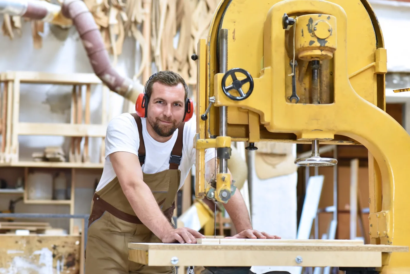 Woodworking professional handling sawn timber